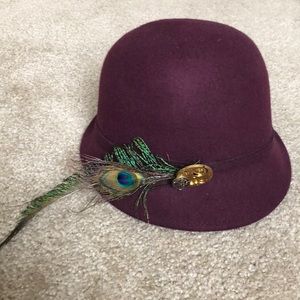 Maroon wool women’s hat with steampunk pendant